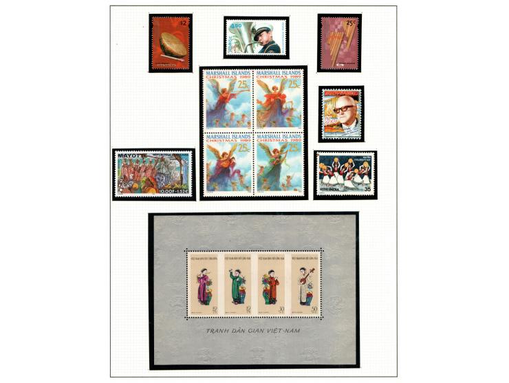 1966 - 2001, A world-spanning collection of music stamps is meticulously organized across four Lindner albums (model 1124). T